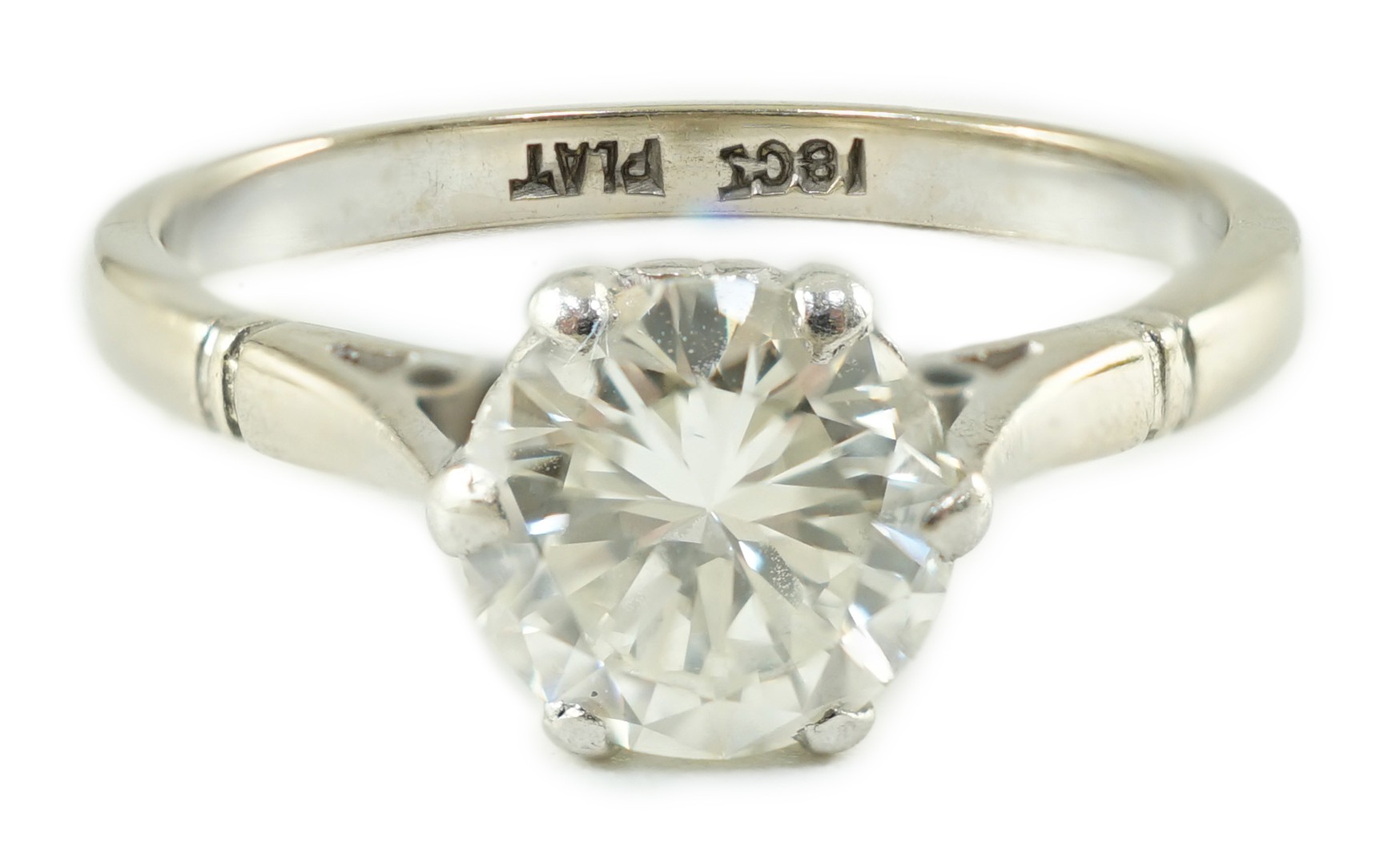 An 18ct white gold, platinum and solitaire diamond set ring